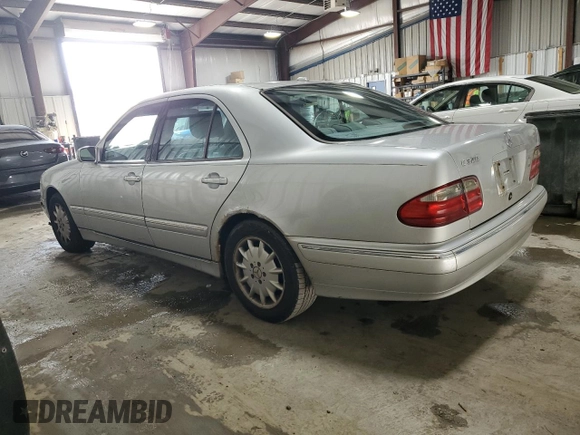 2001 Mercedes-Benz E-Class with VIN WDBJF65J61B198210, listed as a Copart auction lot 72616744 with 305,814 mi miles and Salvage Title. Bid and sale history available at carsss.com. Image 2.