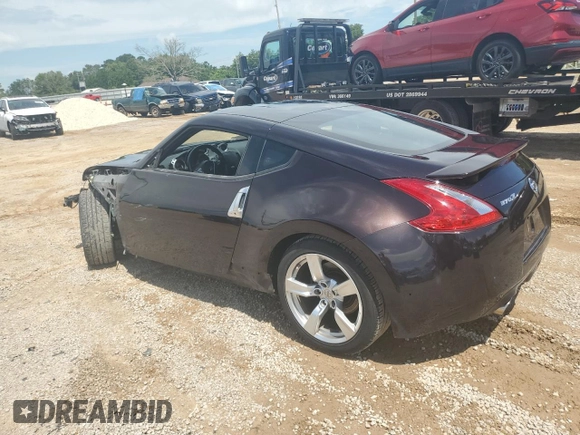 2012 Nissan 370Z Touring with VIN JN1AZ4EH9CM561796, listed as a Copart auction lot 60938314 with 59,011 mi miles and Salvage Title. Bid and sale history available at carsss.com. Image 2.