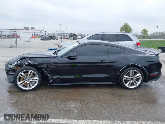 2021 Ford Mustang GT z VIN 1FA6P8CF2M5149643, wystawiony jako IAAI lot #41981794 z przebiegiem 57 345 mil mil oraz . Historia ofert i sprzedaży dostępna na DreamBid. Obrazek 14.
