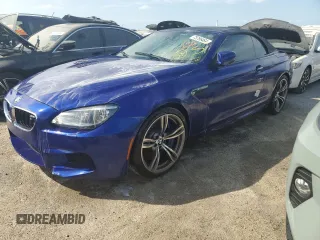 2012 BMW M6 z VIN WBSLZ9C59CC985456, wystawiony jako Copart lot #73796464 z przebiegiem 42 717 mil mil oraz Nie do naprawy • Non repairable. Historia ofert i sprzedaży dostępna na DreamBid. Obrazek 1.