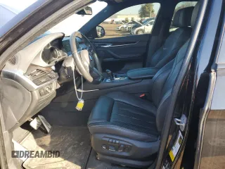 2018 BMW X6 xDrive50i with VIN 5UXKU6C52J0W38970, listed as a Copart auction lot 47597375 with 76,538 mi miles and Salvage Title. Bid and sale history available at carsss.com. Image 7.