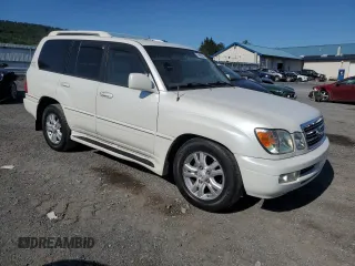 2004 Lexus LX 470 with VIN JTJHT00W243539249, listed as a Copart auction lot 70493974 with 181,155 mi miles and Clean Title. Bid and sale history available at DreamBid. Image 4.