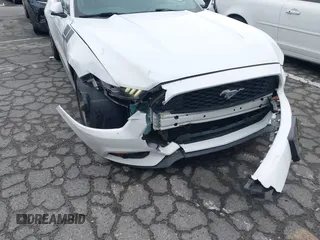 2016 Ford Mustang V6 with VIN 1FA6P8AM2G5292940, listed as a IAAI auction lot 41530716 with 96,876 mi miles and . Bid and sale history available at carsss.com. Image 6.