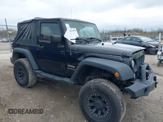 2015 Jeep Wrangler Sport z VIN 1C4AJWAG2FL500717, wystawiony jako IAAI lot #42173959 z przebiegiem 84 228 mil mil oraz . Historia ofert i sprzedaży dostępna na DreamBid. Obrazek 1.