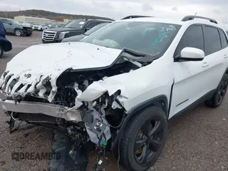 2016 Jeep Cherokee Latitude with VIN 1C4PJMCSXGW214243, listed as a IAAI auction lot 40850362 with 96,240 mi miles and . Bid and sale history available at carsss.com. Image 6.