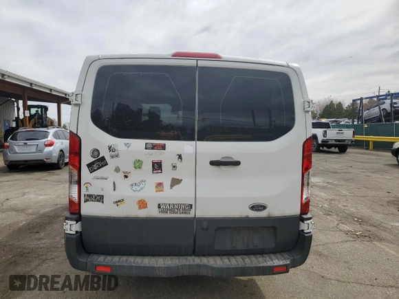 2017 Ford Transit with VIN 1FTYR1ZM7HKB14498, listed as a Copart auction lot 50426995 with 113,262 mi miles and Salvage Title. Bid and sale history available at DreamBid. Image 6.