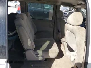 2004 Kia Sedona LX with VIN KNDUP131046585706, listed as a Copart auction lot 74973304 with 107,130 mi miles and Salvage Title. Bid and sale history available at carsss.com. Image 11.