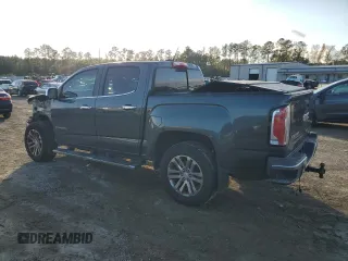 2016 GMC Canyon 2WD SLT with VIN 1GTG5DE37G1271880, listed as a Copart auction lot 79825324 with 141,748 mi miles and Salvage Title. Bid and sale history available at carsss.com. Image 2.