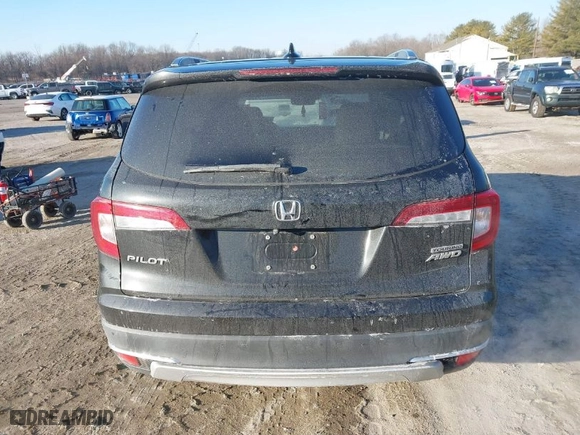 2019 Honda Pilot Touring 7-Passenger with VIN 5FNYF6H65KB061796, listed as a IAAI auction lot 41650857 with 122,417 mi miles. Bid and sale history available at carsss.com. Image 16.