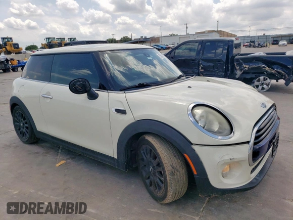 2018 MINI Hardtop Cooper with VIN WMWXP5C53J2G63387, listed as a Copart auction lot 58477465 with 88,282 mi miles and Salvage title. Bid and sale history available at DreamBid. Image 4.