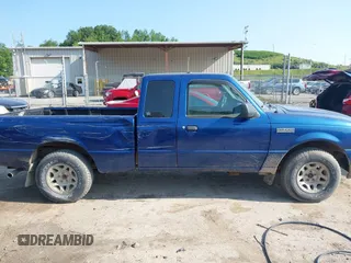 2011 Ford Ranger XLT with VIN 1FTLR4FE2BPA41799, listed as a IAAI auction lot 42390457 with 154,477 mi miles and . Bid and sale history available at DreamBid. Image 13.