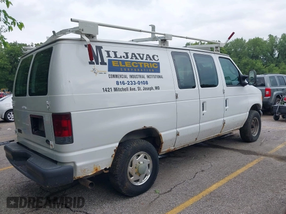 2007 Ford Econoline Cargo Commercial with VIN 1FTNE24L17DA50691, listed as a IAAI auction lot 42754142 with 213,906 mi miles and . Bid and sale history available at DreamBid. Image 4.