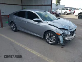 2017 Honda Civic LX z VIN 19XFC2F53HE008998, wystawiony jako IAAI lot #41766055 z przebiegiem 105 740 mil mil oraz . Historia ofert i sprzedaży dostępna na DreamBid. Obrazek 1.