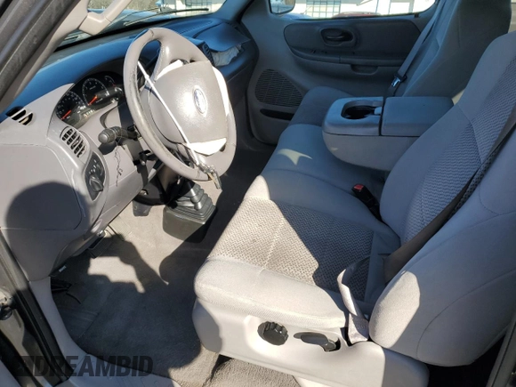 2004 Ford F-150 XL with VIN 2FTRX18W74CA39541, listed as a Copart auction lot 50390125 with Not provided miles and Salvage title. Bid and sale history available at DreamBid. Image 7.