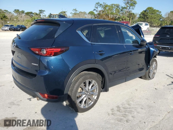 2021 Mazda CX-5 Grand Touring with VIN JM3KFADM9M0401778, listed as a Copart auction lot 46227515 with 44,587 mi miles and Non Repairable. Bid and sale history available at carsss.com. Image 3.