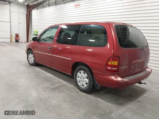 1998 Ford Windstar Wagon LX with VIN 2FMZA5142WBC83393, listed as a IAAI auction lot 41246821 with 203,338 mi miles. Bid and sale history available at carsss.com. Image 3.
