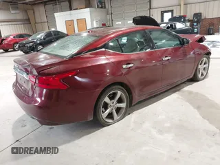 2016 Nissan Maxima SV z VIN 1N4AA6AP8GC431166, wystawiony jako IAAI lot #41973524 z przebiegiem 119 093 mil mil oraz . Historia ofert i sprzedaży dostępna na DreamBid. Obrazek 4.
