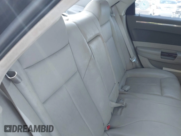 2009 Chrysler 300 Limited with VIN 2C3KA33V59H570460, listed as a IAAI auction lot 42017573 with 130,600 mi miles. Bid and sale history available at carsss.com. Image 8.
