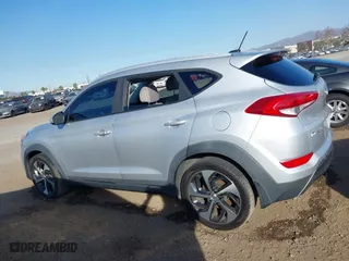 2016 Hyundai Tucson Sport with VIN KM8J33A20GU152145, listed as a IAAI auction lot 41250885 with 117,841 mi miles. Bid and sale history available at carsss.com. Image 14.