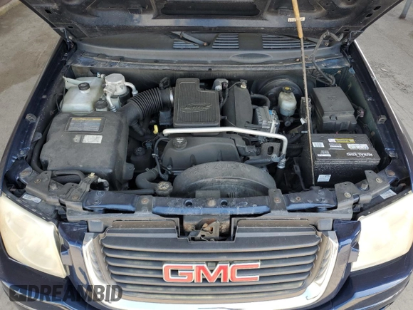 2004 GMC Envoy SLE with VIN 1GKDT13S142201271, listed as a Copart auction lot 50249705 with 248,364 mi miles and Salvage Title. Bid and sale history available at carsss.com. Image 12.