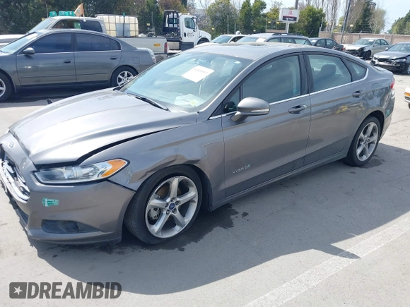 2014 Ford Fusion SE Hybrid with VIN 3FA6P0LU4ER195506, listed as a IAAI auction lot 41859599 with 159,374 mi miles. Bid and sale history available at carsss.com. Image 4.