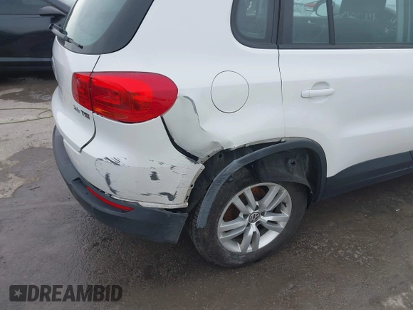 2013 Volkswagen Tiguan S z VIN WVGAV3AX6DW610678, wystawiony jako IAAI lot #41544865 z przebiegiem 102 948 mil mil oraz . Historia ofert i sprzedaży dostępna na DreamBid. Obrazek 19.