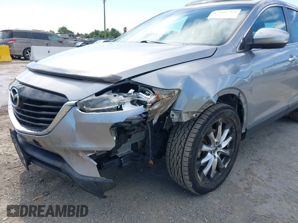 2014 Mazda CX-9 Grand Touring z VIN JM3TB2DVXE0432991, wystawiony jako IAAI lot #42826784 z przebiegiem 134 265 mil mil oraz . Historia ofert i sprzedaży dostępna na DreamBid. Obrazek 6.