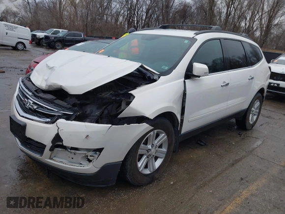 2013 Chevrolet Traverse LT with VIN 1GNKVGKD7DJ176487, listed as a IAAI auction lot 41211283 with 146,844 mi miles and . Bid and sale history available at DreamBid. Image 2.