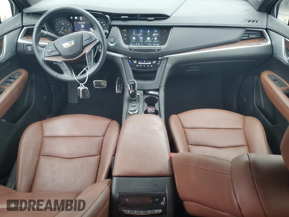 2023 Cadillac XT5 AWD Sport with VIN 1GYKNGRS4PZ176086, listed as a Copart auction lot 53955535 with 15,709 mi miles and Salvage title. Bid and sale history available at DreamBid. Image 8.