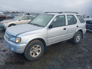 2000 Isuzu Rodeo z VIN 4S2DM58W9Y4301998, wystawiony jako IAAI lot #41265011 z przebiegiem 222 659 mil mil oraz . Historia ofert i sprzedaży dostępna na DreamBid. Obrazek 2.