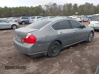 2006 Infiniti M45 Sport with VIN JNKBY01E56M201498, listed as a IAAI auction lot 41498261 with 241,810 mi miles. Bid and sale history available at carsss.com. Image 12.