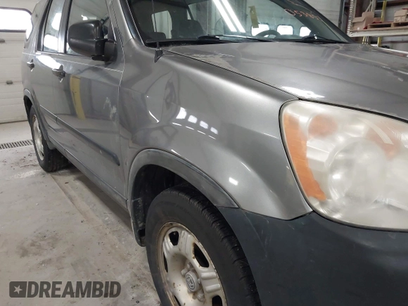 2006 Honda CR-V LX with VIN JHLRD785X6C053853, listed as a IAAI auction lot 42018895 with 246,316 mi miles and . Bid and sale history available at carsss.com. Image 12.