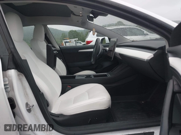 2023 Tesla Model 3 with VIN 5YJ3E1EA2PF626392, listed as a IAAI auction lot 42288413 with 25,605 mi miles and . Bid and sale history available at DreamBid. Image 5.