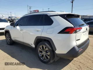 2022 Toyota RAV4 Hybrid XLE Premium with VIN JTMB6RFV1ND521761, listed as a Copart auction lot 52150265 with 46,391 mi miles and Salvage title. Bid and sale history available at DreamBid. Image 2.