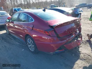 2023 Hyundai Sonata SEL with VIN KMHL14JA4PA326571, listed as a IAAI auction lot 41476619 with 53,881 mi miles. Bid and sale history available at carsss.com. Image 3.