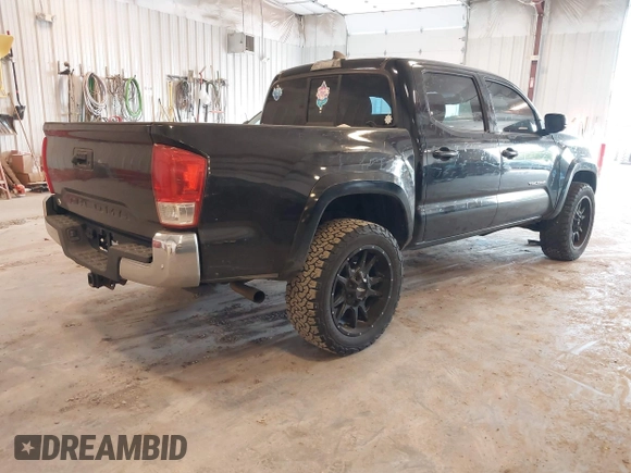 2017 Toyota Tacoma SR5 with VIN 5TFCZ5AN0HX053441, listed as a IAAI auction lot 42376148 with 100,996 mi miles and . Bid and sale history available at DreamBid. Image 4.
