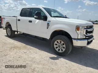 2021 Ford F-250 XL with VIN 1FT7W2B62MEC44459, listed as a Copart auction lot 63193104 with 118,334 mi miles and Salvage title. Bid and sale history available at DreamBid. Image 4.