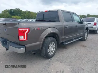 2015 Ford F-150 XLT with VIN 1FTEW1EP1FFC72160, listed as a IAAI auction lot 40351662 with 142,647 mi miles. Bid and sale history available at carsss.com. Image 4.