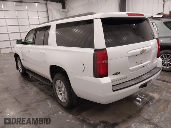 2020 Chevrolet Suburban LT with VIN 1GNSKHKC5LR108971, listed as a IAAI auction lot 41651417 with 90,674 mi miles. Bid and sale history available at carsss.com. Image 3.