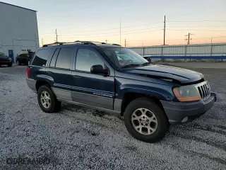 1999 Jeep Grand Cherokee Laredo with VIN 1J4GW58N6XC784679, listed as a Copart auction lot 85345304 with 234,584 mi miles and Salvage Title. Bid and sale history available at carsss.com. Image 12.