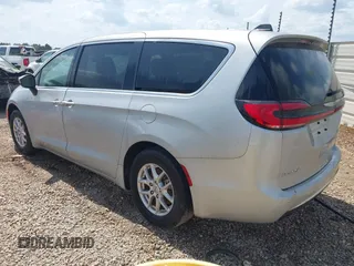 2023 Chrysler Pacifica Touring L with VIN 2C4RC1BG7PR521232, listed as a IAAI auction lot 42087909 with 34,609 mi miles and . Bid and sale history available at DreamBid. Image 3.