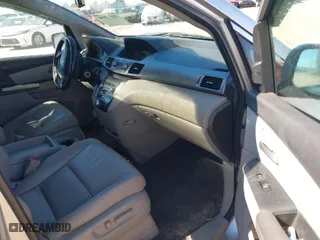2013 Honda Odyssey Touring with VIN 5FNRL5H93DB076463, listed as a IAAI auction lot 41819994 with 188,911 mi miles. Bid and sale history available at carsss.com. Image 5.