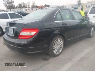 2009 Mercedes-Benz C-Class 3.0L Sport with VIN WDDGF54X19F207143, listed as a IAAI auction lot 41718227 with 128,147 mi miles. Bid and sale history available at carsss.com. Image 4.