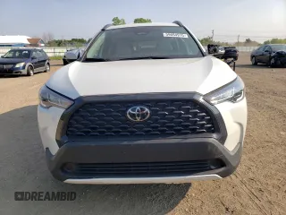 2023 Toyota Corolla Cross LE with VIN 7MUCAABG3PV060880, listed as a Copart auction lot 59664915 with 18,246 mi miles and Salvage title. Bid and sale history available at DreamBid. Image 5.