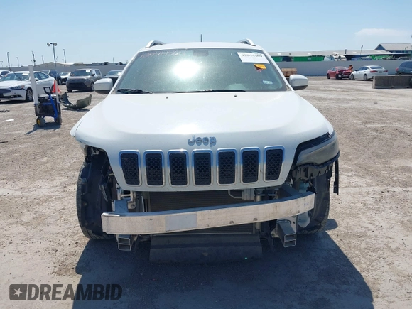 2019 Jeep Cherokee Latitude with VIN 1C4PJLCB9KD285111, listed as a IAAI auction lot 42044469 with 123,947 mi miles and . Bid and sale history available at DreamBid. Image 6.