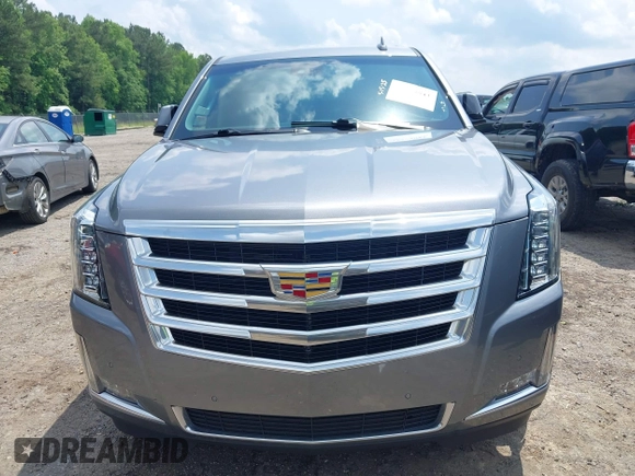 2020 Cadillac Escalade Luxury z VIN 1GYS3BKJ0LR116410, wystawiony jako IAAI lot #42274841 z przebiegiem 75 513 mil mil oraz . Historia ofert i sprzedaży dostępna na DreamBid. Obrazek 6.