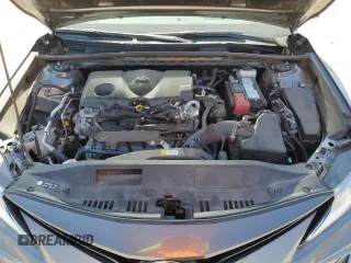 2024 Toyota Camry LE z VIN 4T1R11AK2RU216038, wystawiony jako Copart lot #56582725 z przebiegiem 42 623 mil mil oraz Szkoda całkowita • Salvage title. Historia ofert i sprzedaży dostępna na DreamBid. Obrazek 11.
