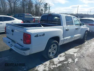 2007 Dodge Dakota SLT z VIN 1D7HW48JX7S166780, wystawiony jako IAAI lot #41375942 z przebiegiem 148 778 mil mil oraz . Historia ofert i sprzedaży dostępna na DreamBid. Obrazek 4.