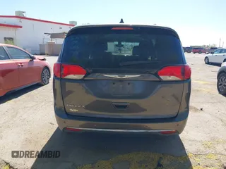 2017 Chrysler Pacifica Touring L with VIN 2C4RC1BG0HR826881, listed as a IAAI auction lot 42171240 with 214,188 mi miles and . Bid and sale history available at DreamBid. Image 16.