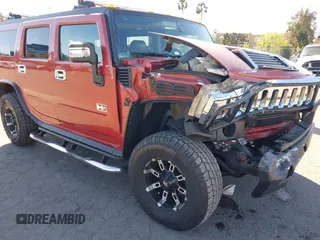 2003 Hummer H2 with VIN 5GRGN23U23H104200, listed as a IAAI auction lot 41687769 with 1 mi miles. Bid and sale history available at carsss.com. Image 6.